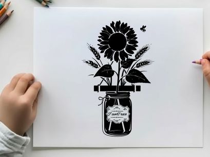 Silhouette of sunflower in a mason jar vase