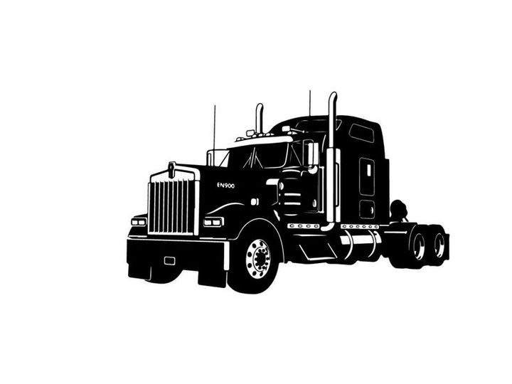 Silhouette of a large semi truck with trailer
