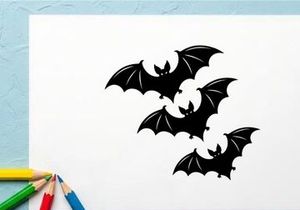 Silhouettes of Flying Bats in Dark Night Sky for Halloween or Horror Themes