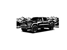 Silhouette of a pickup truck in front of mountains