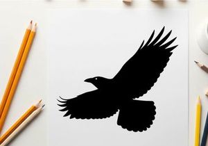 Silhouette of a bird in flight with outstretched wings and tail feathers