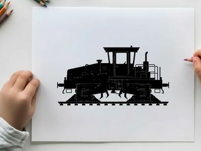 Silhouette of a caterpillar tractor on railroad tracks