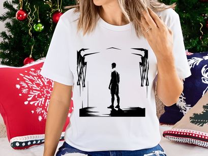 Silhouette of a man standing in a dark room with bright light