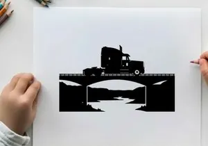 Truck silhouette crossing a bridge over a river at sunset
