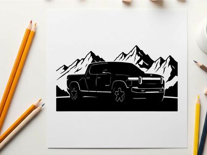 Silhouette of a pickup truck in front of majestic mountain range silhouette