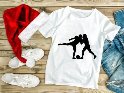 Two soccer players in action kicking ball in mid play