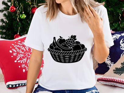 Fresh fruit basket with bananas apples grapes and flowers in woven design