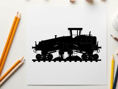 Silhouette of a large industrial train engine on railroad tracks