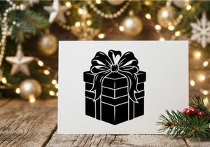 Black and white Christmas gift box with bow and ribbon