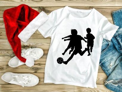 Children playing soccer silhouette