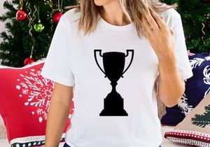 A black silhouette of a classic trophy cup on a white background