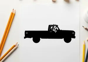 Silhouette of a pickup truck with a dog