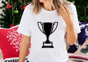 A black and white image of a trophy cup on a pedestal base