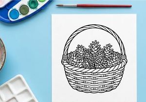 Line art illustration of a wicker basket filled with pine cones