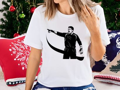 A soccer referee directing play with authority and focus