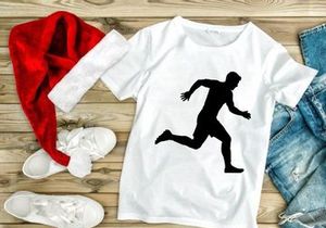 A silhouette of a man running quickly with athletic posture and movement