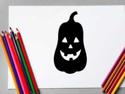 Silhouette of a Halloween Jack-o'-Lantern with a spooky face