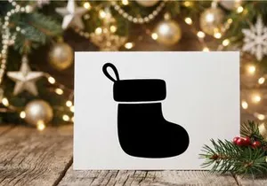 Black silhouette of a Christmas stocking isolated on a white background