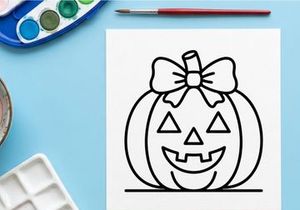 Hand-drawn Halloween jack-o-lantern with bow. Cute smiling pumpkin illustration for festive autumn decor.