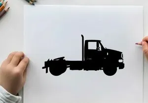 Silhouette of a large truck with a flatbed and cabin silhouette