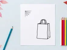 Empty shopping bag isolated on white background. Minimalist paper tote ready for retail branding and packaging design.