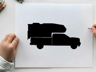 Silhouette of a delivery truck with cargo on top