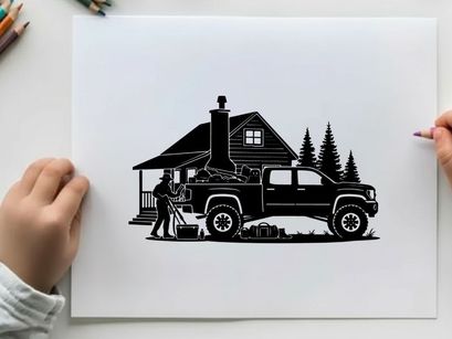 Silhouette of a man loading wood beside a truck and cabin