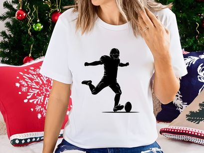 American football player kicking a ball in action silhouette