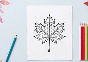 Maple leaf line art with polka dots. Hand drawn botanical illustration for coloring page.