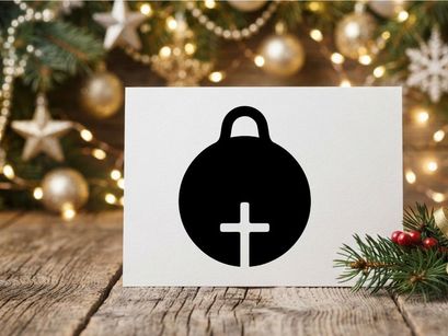 Black Christmas ornament icon with a cross symbol for religious holiday design projects
