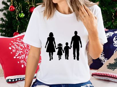 Happy family holding hands walking together silhouette outdoor