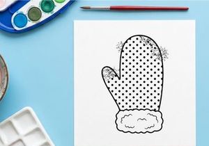 Polka dot winter mitten illustration with snowflakes for Christmas holiday design