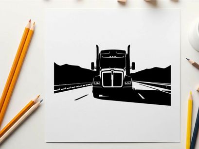 Silhouette of a semi truck driving on a highway with mountains