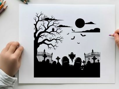 Silhouette of a spooky graveyard on a dark and eerie night