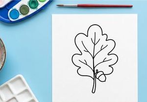 Close-up of an oak leaf with acorn. Nature-inspired botanical detail for eco or outdoor themes.