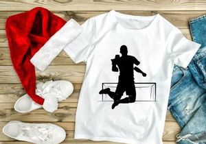A silhouette of a triumphant athlete jumping over a hurdle in a celebratory pose