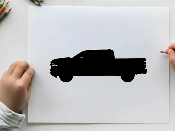 Silhouette of a black pickup truck on a white background