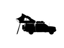 Silhouette of a pickup truck with a tent on the back
