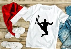 Soccer player kicking a ball in mid air with dynamic movement and skill