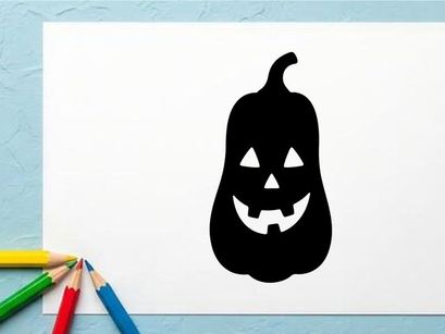 Silhouette of a Halloween Jack-o'-Lantern with a spooky face