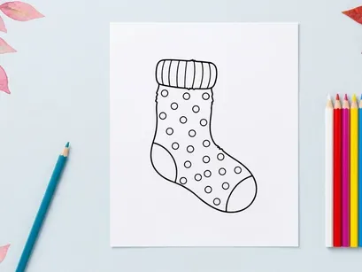 Hand drawn Christmas stocking with polka dot pattern isolated on white background