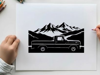 Silhouette of a pickup truck in front of majestic mountains silhouette