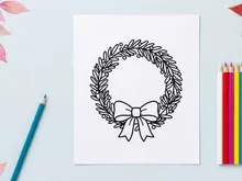 Hand-drawn Christmas laurel wreath with white bow and festive greenery vector illustration