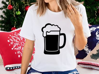 Classic beer mug filled with dark ale isolated on white background