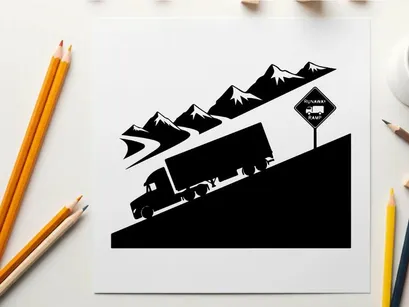 Truck driving down a mountain road in silhouette