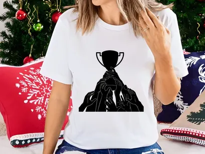 A group of hands holding up a trophy in celebration and teamwork