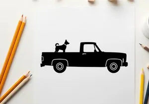 Silhouette of a dog riding in the back of a pickup truck