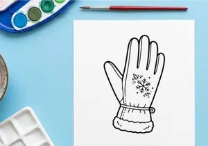 Hand-drawn winter glove with snowflake pattern for festive holiday celebrations and gifts