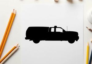 Silhouette of a pickup truck with a covered cargo bed