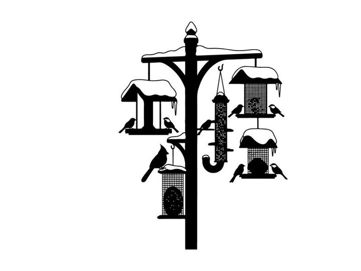 Silhouette of bird feeders on a snowy tree branch
